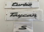 Porsche Taycan Turbo Gloss Black Rear Emblems. Fixed Price $170.00.