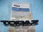 Nos 1988 1989 Mercury Topaz Trunk Lid Emblem E86Y-5442528-A. Fixed Price $15.00.