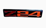 1986-1987 Chevrolet Cavalier "Z24" Metal Interior Door Emblem Used 20597750. Fixed Price $28.00.