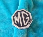 Vintage Octagonal Mg Emblem #CHA344 Black And Silver Badge Original. Fixed Price $22.00.