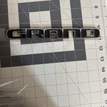 Genuine Oem Mopar Jeep 68638530AA 'grand' Door Nameplate 2017-22 Cherokee. Fixed Price $35.00.