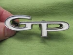 1964 Pontiac Grand Prix "gp" Grille Emblem 9774488 - Good Studs W/speed Nuts. Fixed Price $22.56.