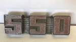 International 550 Emblem Badge Nameplate Script Metal Ornament. Fixed Price $68.00.