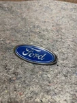 Ford Rear Trunk Emblem F8CB-8C046-AA. Fixed Price $11.00.