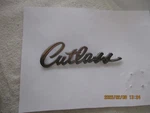 Nos 1969 Oldsmobile Cutlass Diecast Metal Trunk Lid Emblem-part No. 8727372. Fixed Price $35.00.
