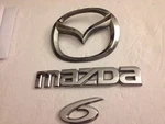 03-08 Mazda Emblem Rear Trunk Logo Nameplate Genuine P# GJ6A-51730. Fixed Price $25.95.