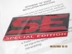 Genuine Mitsubishi Oem ACU06SLR02 Badge, Se, Pdc - Outlan. Fixed Price $39.99.