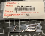 2007-2025 Toyota "le" Deck Lid Liftgate Emblem 75443-06A60 Chrome. Fixed Price $16.00.