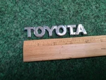 Toyota 04-08 Solara 09-11 Matrix Rear Trunk Lid Hatch Emblem Oem 75447-AA040 4S4. Fixed Price $18.99.