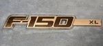 2009-14 Ford F-150 Xl Emblem Right Passenger 9L34-16B114-BC. Fixed Price $20.00.