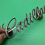 1968 Cadillac Deville Grille Script Nameplate Emblem Oem #1490224. Fixed Price $44.99.