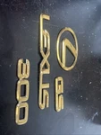 1998-2005 Lexus GS300 Rear Gold Badge Emblem Set. Fixed Price $70.00.