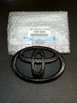 New Toyota Black Carbon 14CM Logo Emblem Badge For Grille Corolla Altis. Fixed Price $170.00.
