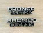 1978-1979 Ford Bronco Custom Emblem Pair Used Vintage D8TB-98023A48-CW 47282. Fixed Price $30.00.