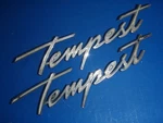 1962 Pontiac Tempest 1/4 Emblem Script 539695. Fixed Price $59.99.