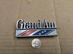 Pontiac Oem 1973 1974 Grand Rear Trunk Emblem Badge Logo Nameplate 9676369. Fixed Price $49.99.