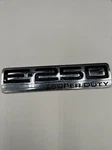 09-14 Ford Econoline E-250 Super Duty Emblem 6C24-15402A17. Fixed Price $34.00.