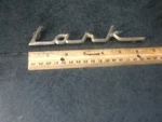 Vintage Auto Emblem Badge Studebaker Lark Part # 69104 1332235 Original Metal. Fixed Price $9.23.