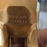 Mack Bulldog Hood Ornament Emblem Gold Tone Collar Reg. No. 1,387,477. Fixed Price $250.00.