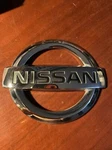 2008-2015 Nissan Rogue Oem 84890-JM00A Rear Hatch Lift Gate Emblem Logo. Fixed Price $7.00.