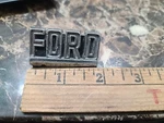 Oem 1950S Ford Block Letters Emblem 7043516-A Latch Badge. Fixed Price $23.96.