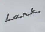 1959 1961 Studebaker Lark Fender Script Emblem Badge Oem #1332235. Fixed Price $24.95.