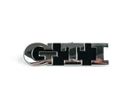 Vw Golf Grille Emblem With Gti Lettering Genuine 1K6853679D. Fixed Price $64.56.