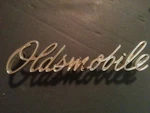 Oldsmobile Script Emblem Oem Part# 8723105. Fixed Price $30.99.