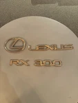 Oem 99-03 Lexus RX300 Rear Emblems Hatch (gold Has Dulled Bit). Fixed Price $25.00.
