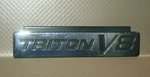 1997-2004 Ford Truck Triton V8 Emblem (4.25") Fomoco Part # XL34-168114-HA. Fixed Price $7.99.