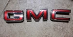 Oem Red Front Grille Emblem Part Number 84360935 Gmc Complete Set. Fixed Price $69.00.