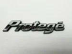 Oem 2001-2003 Mazda Protege Sedan Rear Emblem Badge Logo BL8E 51 720. Fixed Price $8.99.