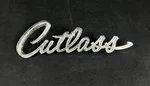 Vintage Oldsmobile Cutlass Script Emblem #7791576. Fixed Price $25.00.