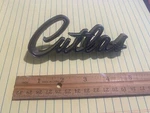 1969 Oldsmobile Cutlass Emblem Part # 399503 - Note: Broken Missing. Fixed Price $15.00.