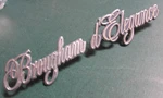 Pair Cadillac Brougham D'elegance Script Logo Emblems - Black 20082676 20082807. Fixed Price $29.99.