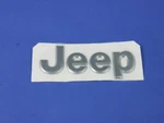Chrysler Oem 99-04 Cherokee Lift Gate Exterior Trim-nameplate 55155622AB. Fixed Price $88.81.