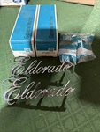 1975-76 Cadillac Eldorado Rear Quarter Panel Emblem Pair Nos 9633431. Fixed Price $161.99.