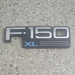 (1) 1997-2003 Ford F-150 Xl Emblem Badge Oem Super Duty. Fixed Price $15.29.