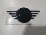Mini Genuine F54 Black Front Bonnet Badge Emblem Plaque 51149880864. Fixed Price $53.60.