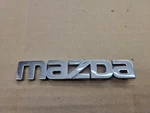 Mazda Oem Chrome Plastic 4 5/8" Emblem Badge Logo Nameplate Insignia GD7A-51-711. Fixed Price $11.99.