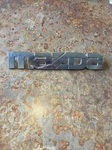 Mazda Oem 200-2006 Mpv Rear Tail Gate Emblem Badge Logo Nameplate LC63 51 710. Fixed Price $9.99.