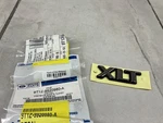 Genuine New Oem Ford Nameplate "xlt" #9T1Z-9920980-A. Fixed Price $37.99.