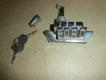Vintage Ford 7043516-A Latch Sliding Metal Emblem W/ Hurd Keys. Fixed Price $89.99.