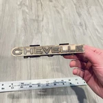 Chevrolet Chevelle Grille Emblem Badge Script Trim Metal Nameplate #328996. Fixed Price $16.99.
