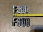 1973-79 Ford F600 Emblem Pair Tabs Intact D3TB-16720-EB. Fixed Price $39.99.