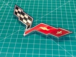 2005 - 2013 Chevrolet Corvette Front Bumper Flags Emblem Used Oem 22901567. Fixed Price $49.95.