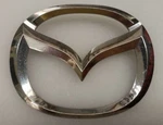 Mazda Emblem/badge P/n 1A51731 Genuine Oem 30 Day Warranty!!. Fixed Price $8.74.