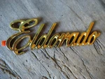 Nos 1980'S Cadillac Eldorado Gold Emblem 4-3/4" Gm 20688258 Box. Fixed Price $79.99.
