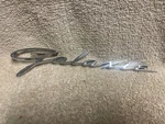 Used Ford C2AB-16098-A 1962 Galaxie 500 Front Fender Script Emblem. Fixed Price $75.00.