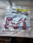 1983-1991 Gmc Replacement Red Letter Emblem New # 1561-7083 Nos Nib. Fixed Price $25.00.